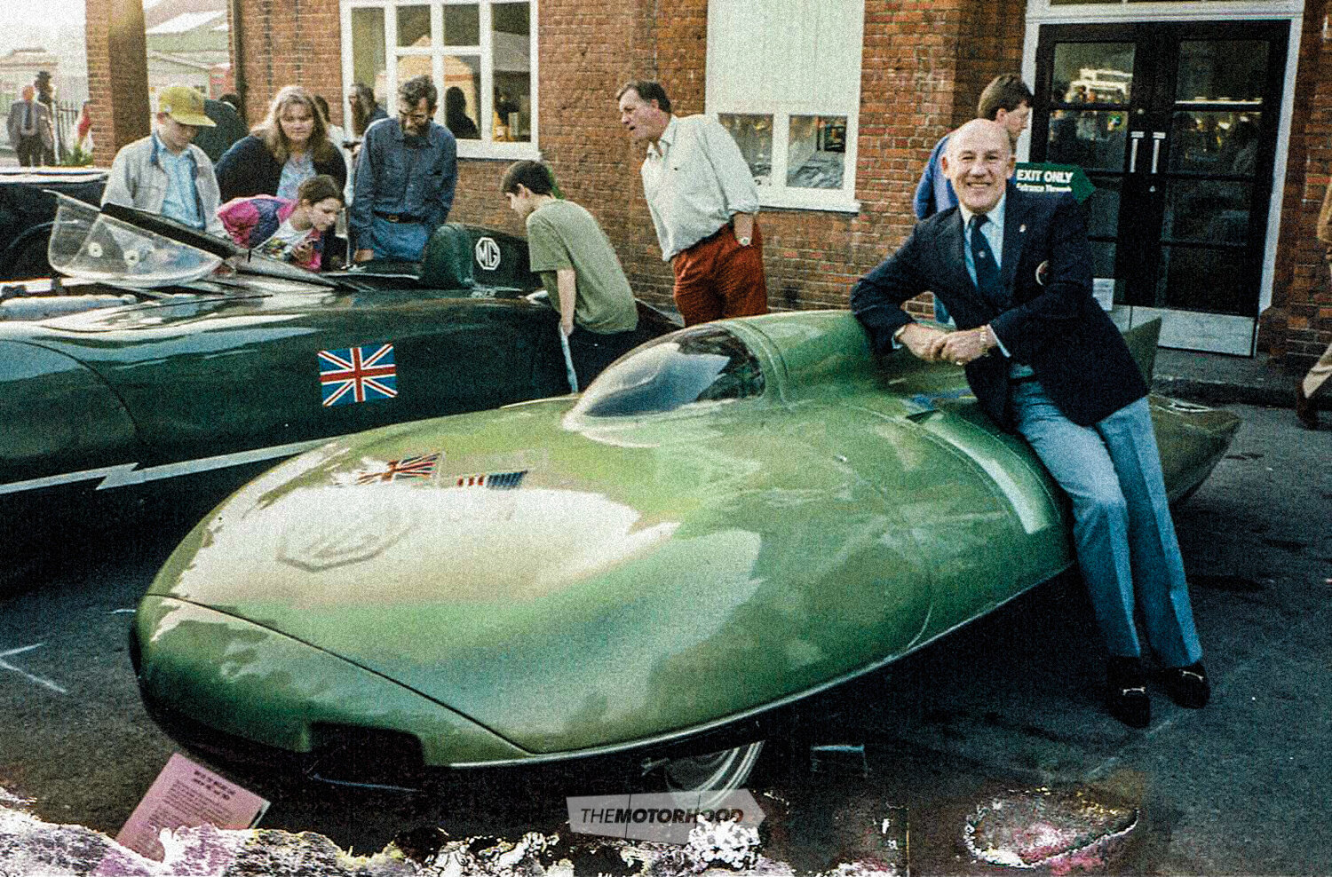 Stirling with the MG EX 181 record-breaking car at the Brooklands Museum in Surrey, England, 1998 — 41 years after he drove it on the Bonneville Salt Flats in the US in what was, he said, a frightening experience