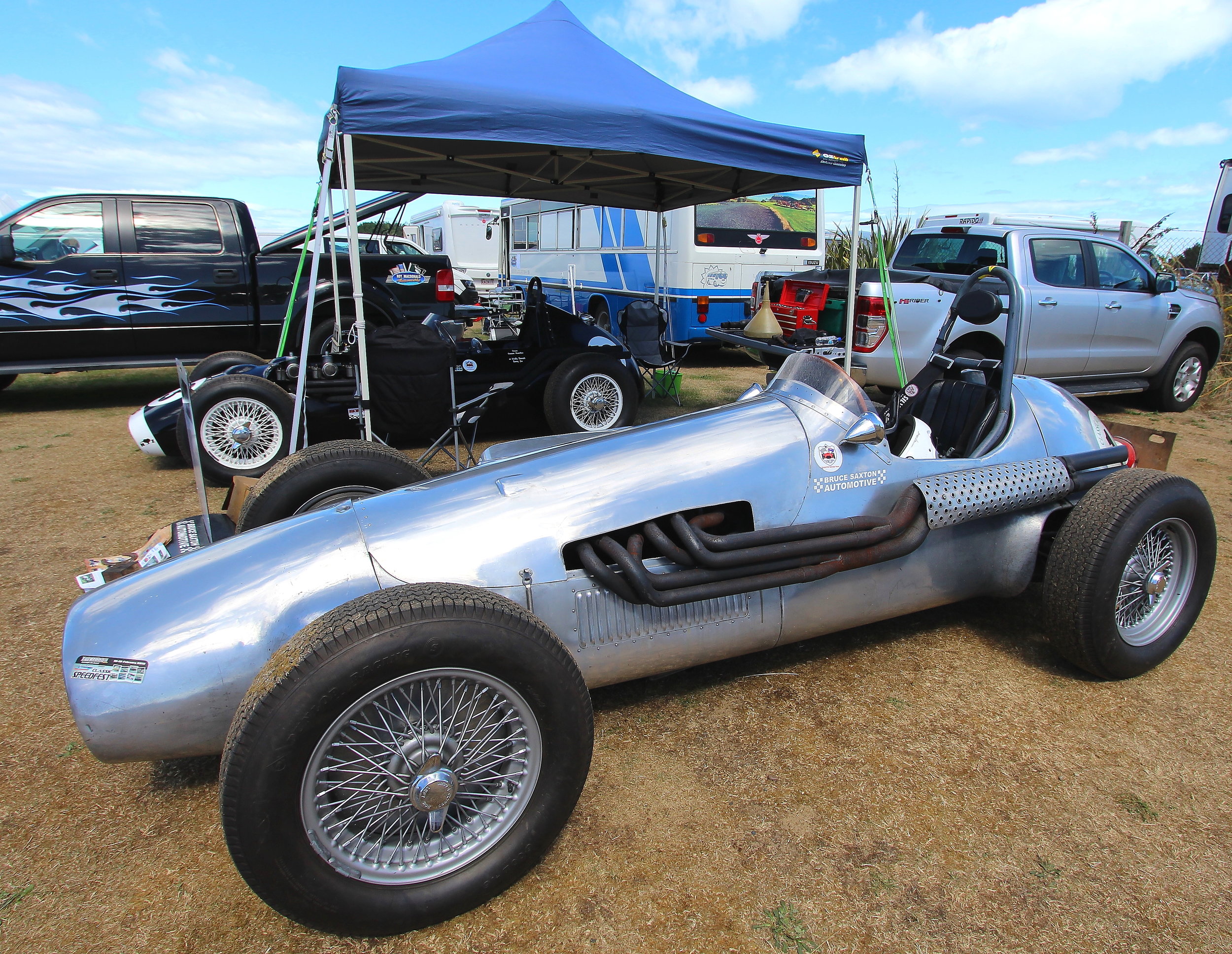 Cooling off: Paul Coghill’s (Dunedin) lovely Jaguar Special with Graeme Hamilton’s (Lyttelton) ACEIII in the background